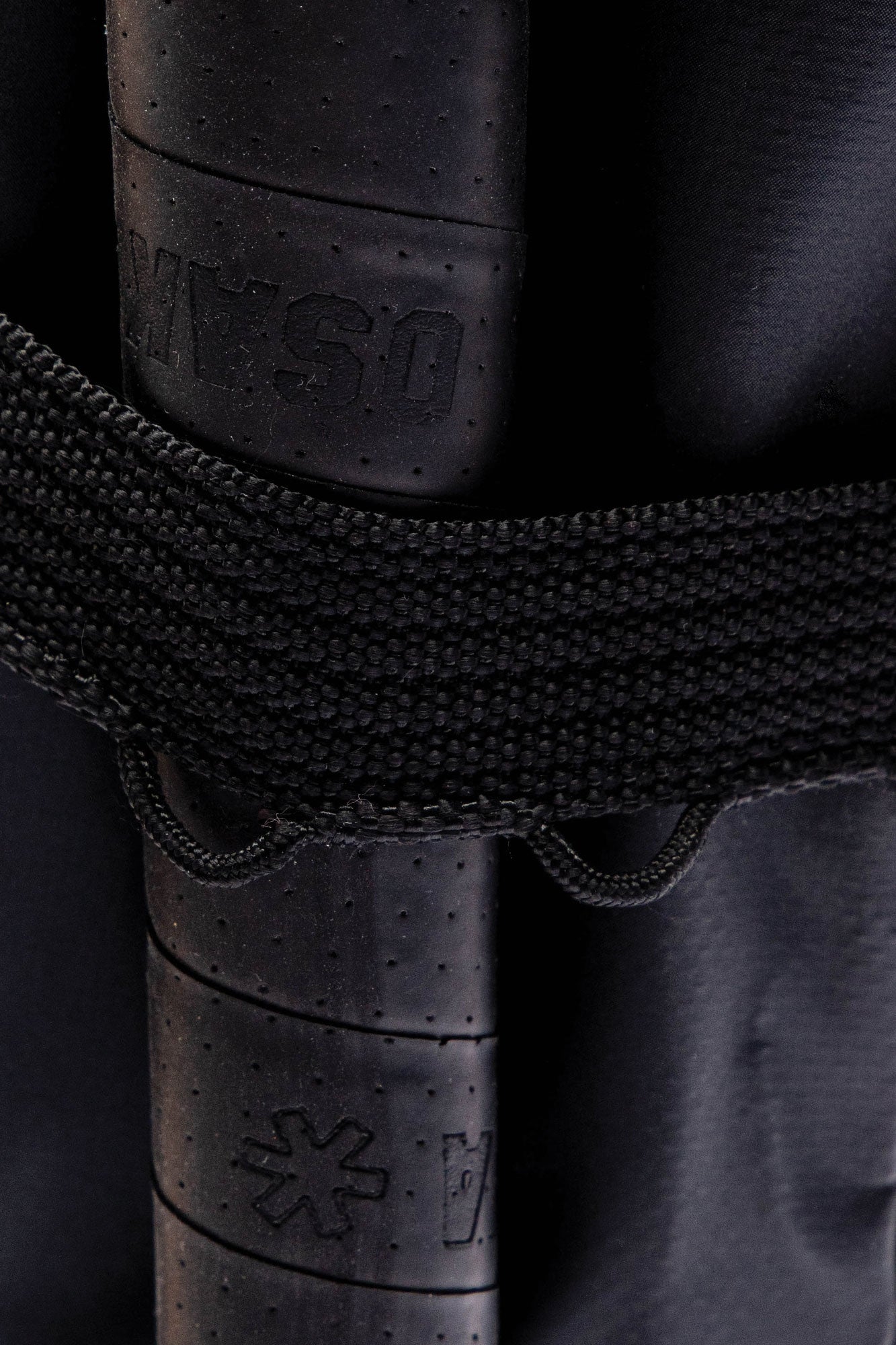 Osaka x Nexus backpack medium in black with white Osaka and Nexus logo on it. Detail view