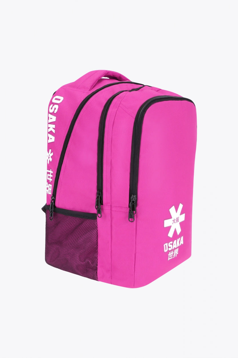 Osaka sports backpack in pink with logo in white. Side view
