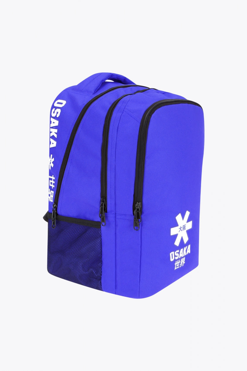Osaka sports backpack in blue with logo in white. Side view