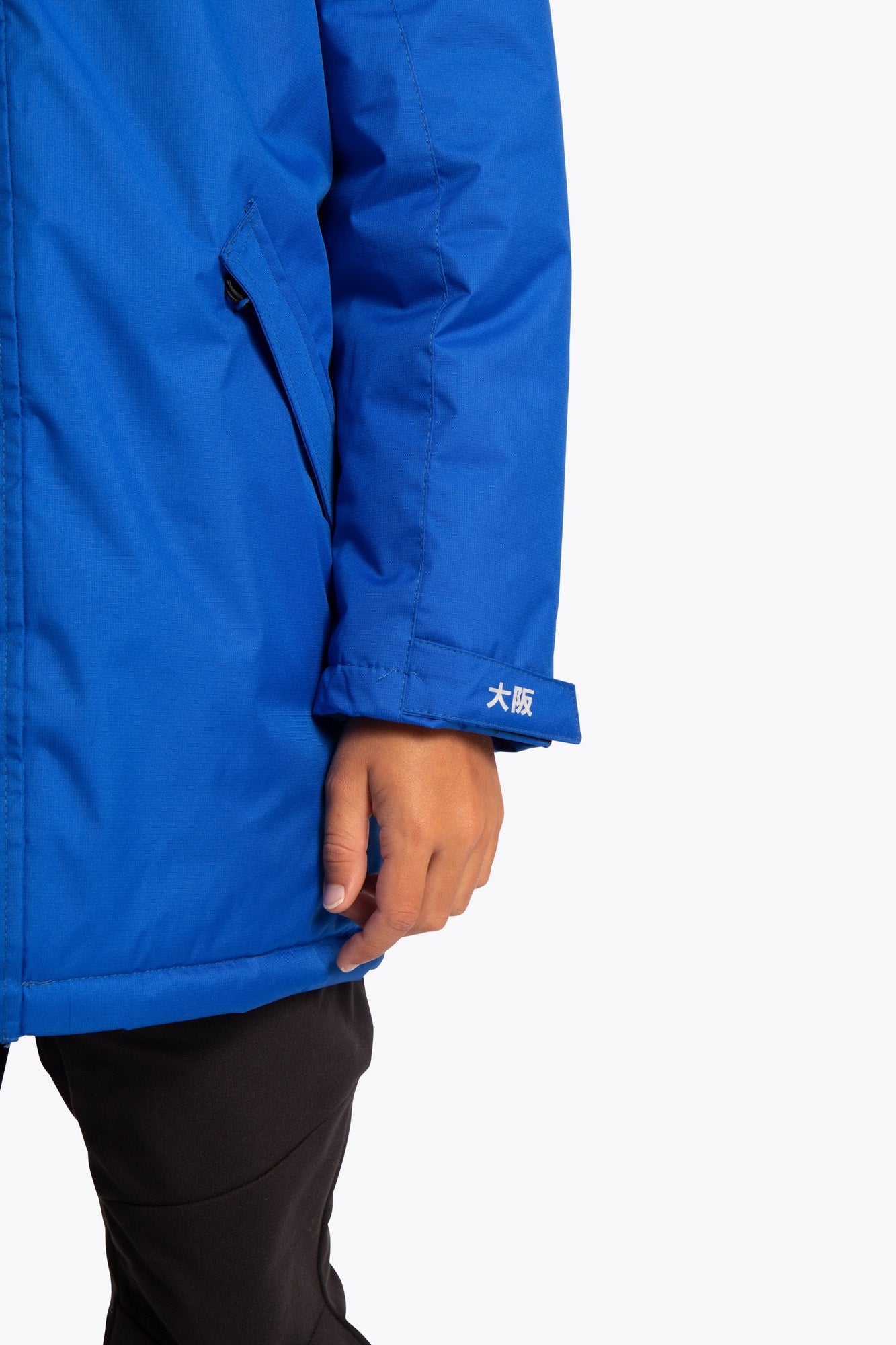 Osaka Kids Stadium Jacket in Navy Blue. Front detail sleeve view