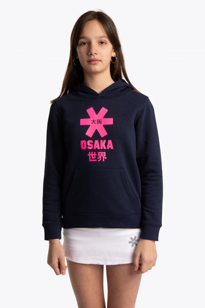Girl wearing the Osaka kids hoodie in navy with pink star logo. Front view