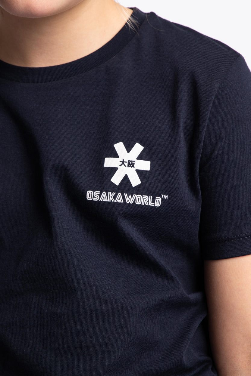 Osaka kids service games tee short sleeve navy with logo in white. Detail view logo
