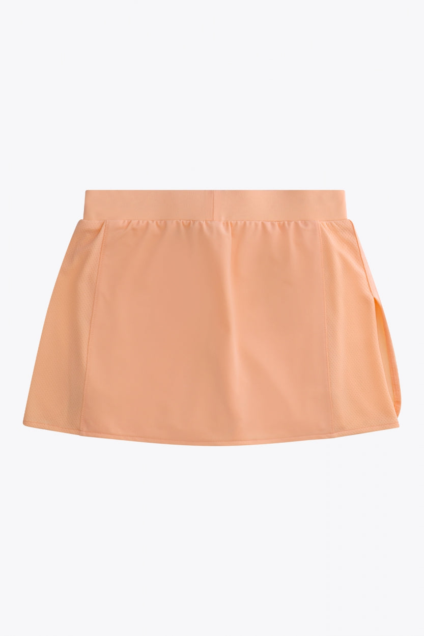 Osaka women ball skort in peach with logo in grey. Back flatlay view