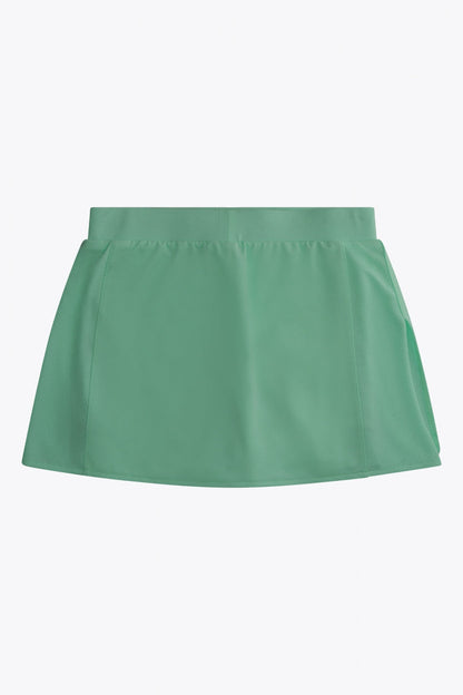 Osaka women ball skort in green with logo in grey. Back flatlay view