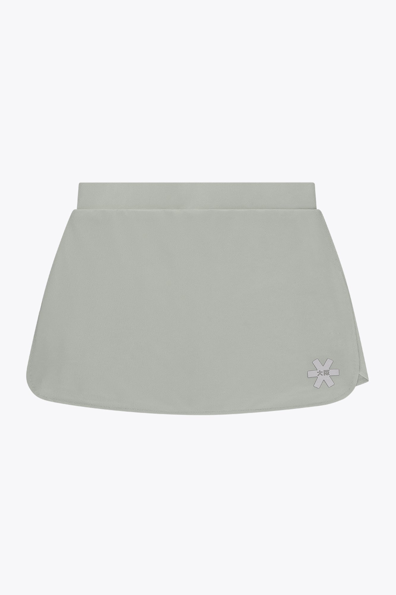 Osaka women ball skort in light grey with logo in grey. Front flatlay view