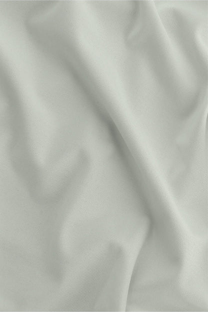 Osaka women ball skort in light grey with logo in grey. Detail fabric view