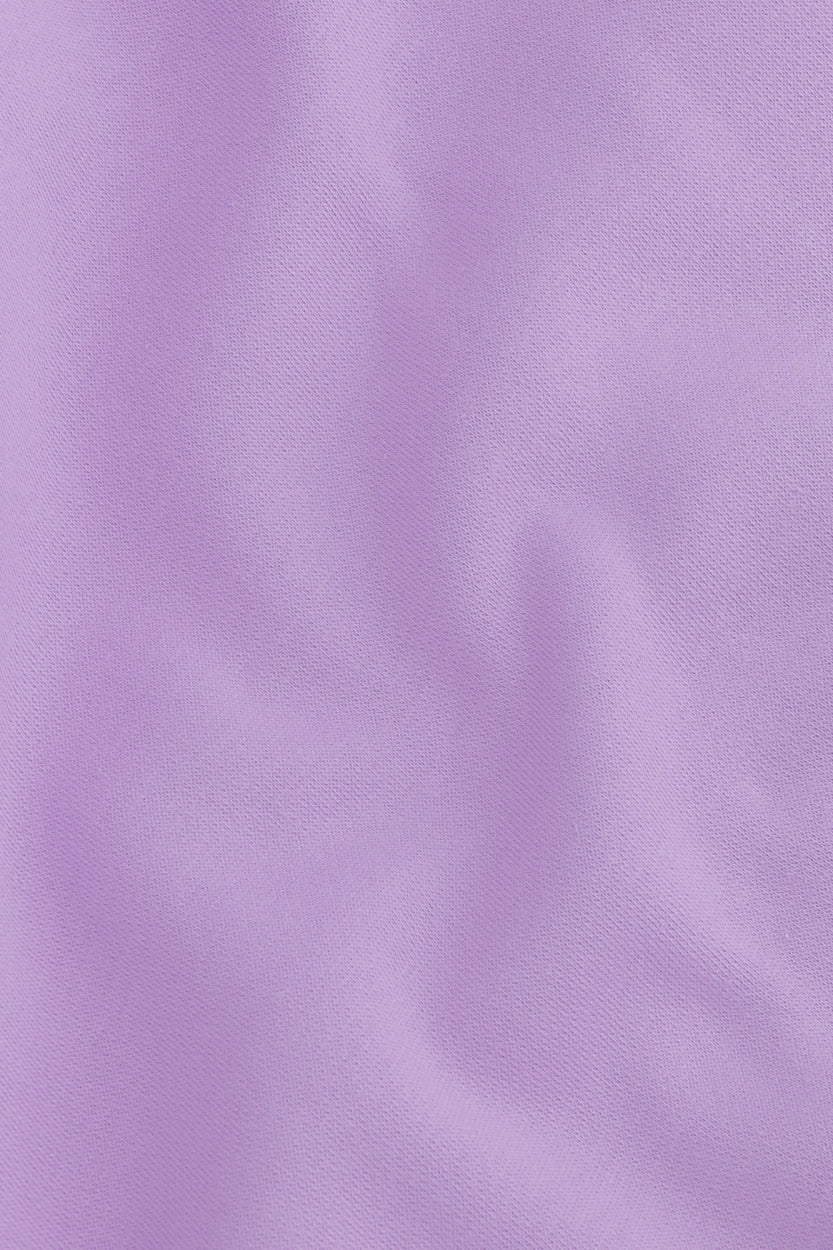 Osaka women half zip sweater in light purple with white logo. Detail fabric view