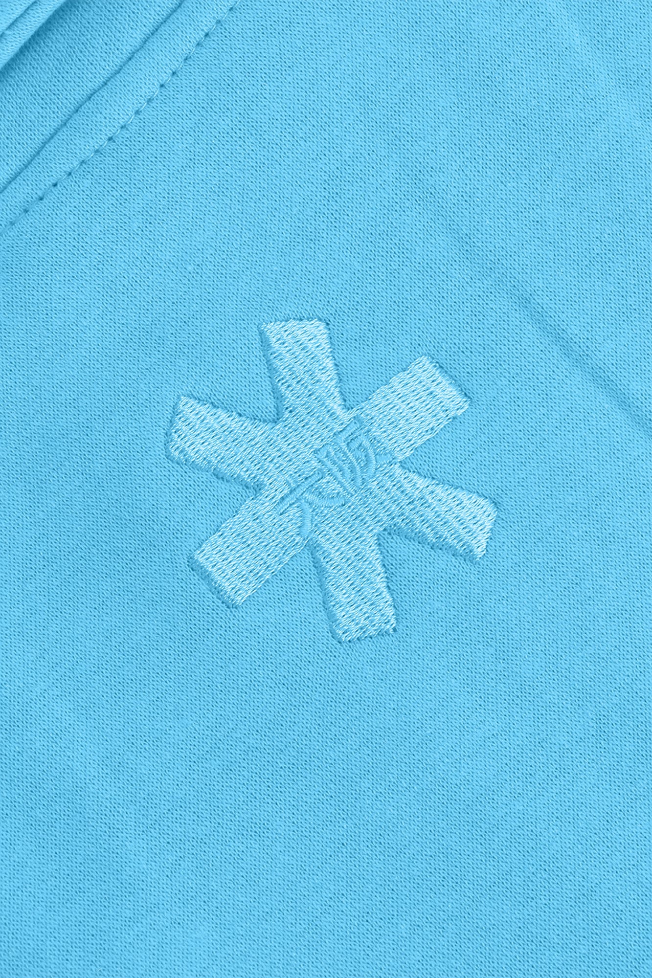 Osaka women half zip sweater in light blue with white logo. Back logo view