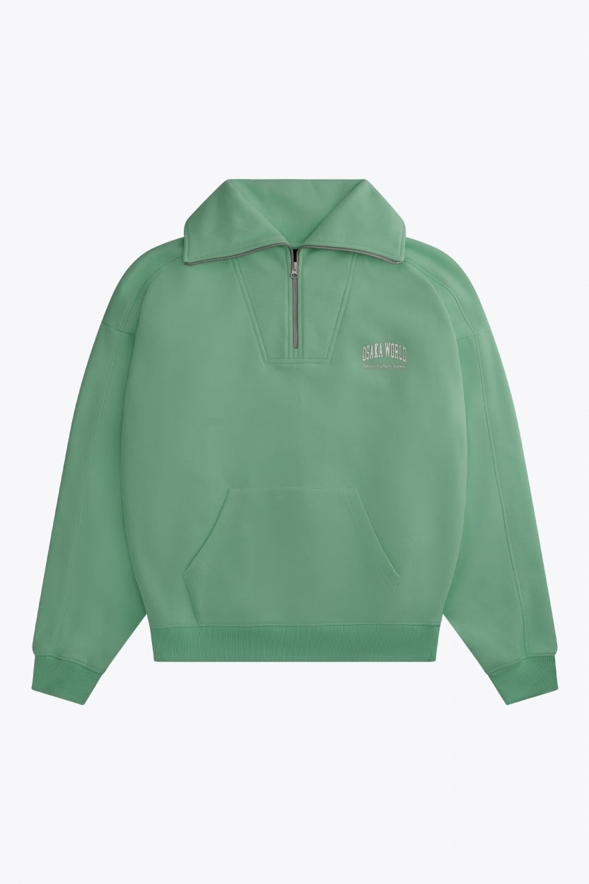 Osaka women half zip sweater green. Front flatlay view