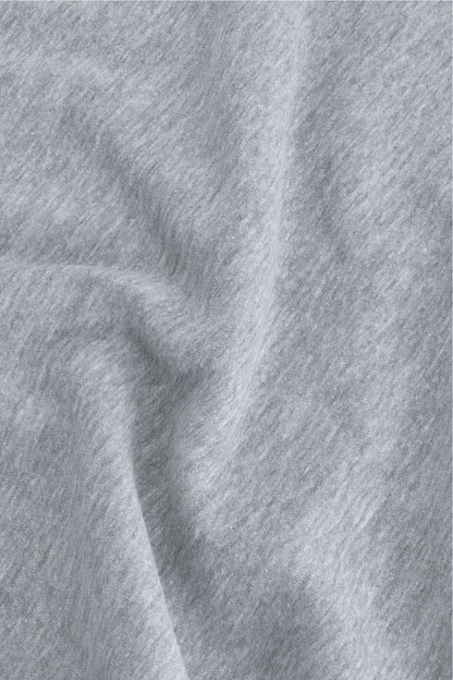 Osaka women half zip sweater in heather grey with white logo. Detail fabric view