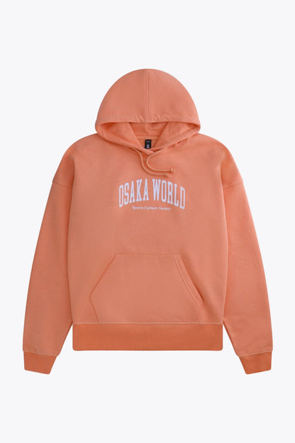 Osaka women hoodie in peach with white logo. Front flatlay view