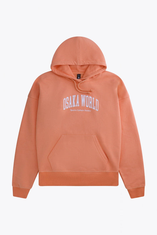 Osaka women hoodie in peach with white logo. Front flatlay view
