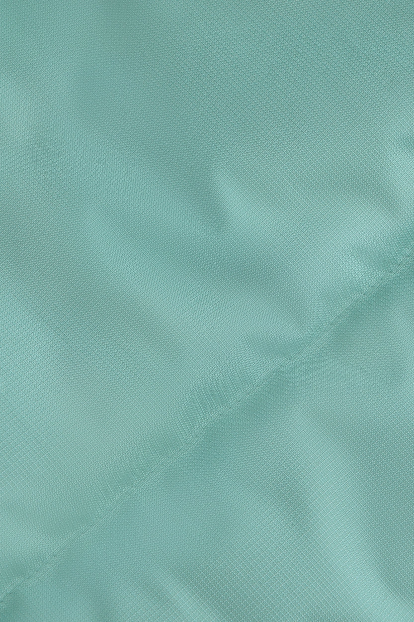 Osaka women padded gilet in green with grey logo. Detail fabric view