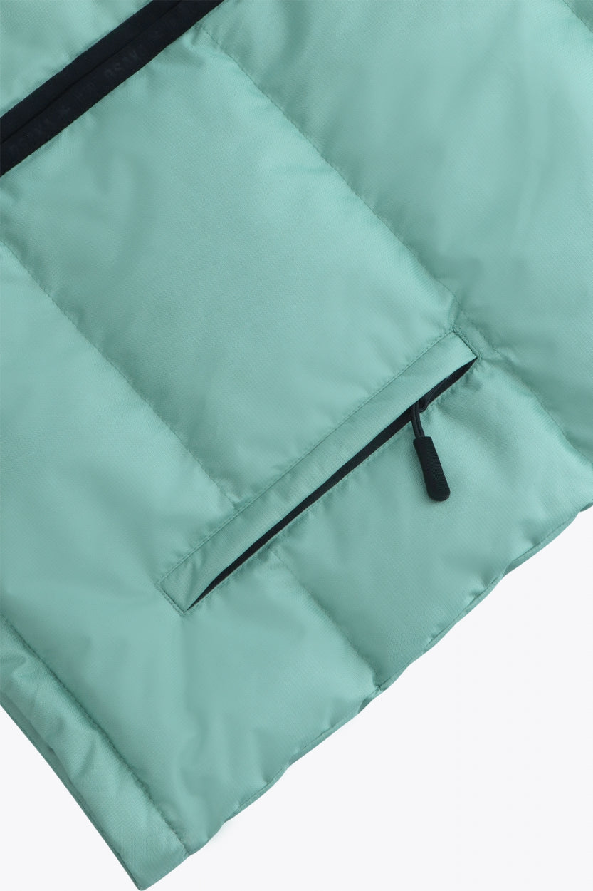 Osaka women padded gilet in green with grey logo. Front detail pocket view