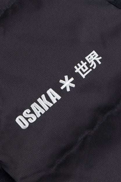 Osaka women padded gilet in black with white logo. Front detail logo view