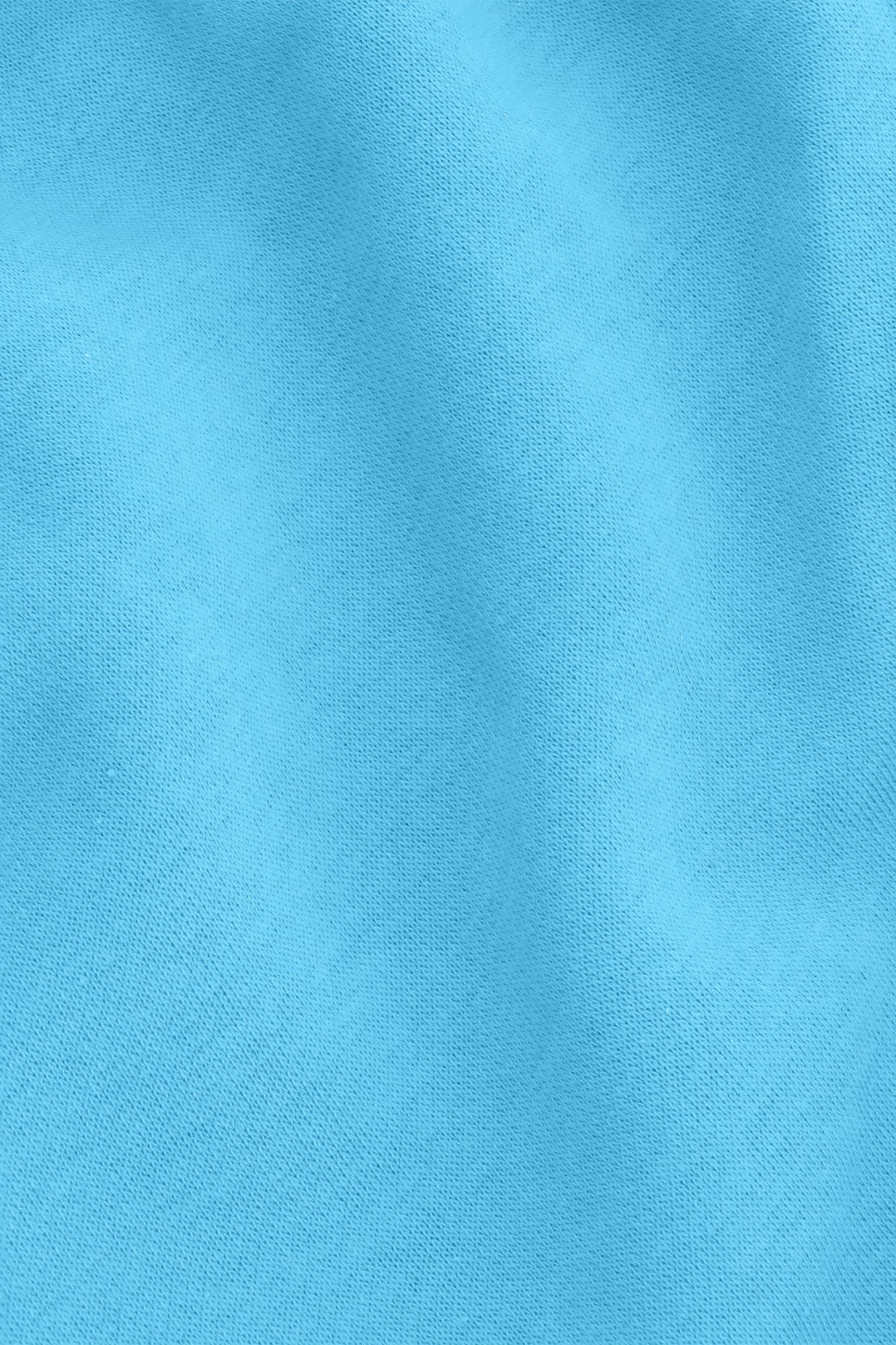 Osaka women shorts in light blue with logo in white. Detail fabric view