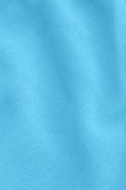 Osaka women shorts in light blue with logo in white. Detail fabric view