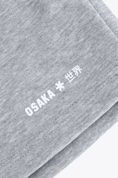 Osaka women shorts in heather grey with logo in white. Front flatlay detail logo view