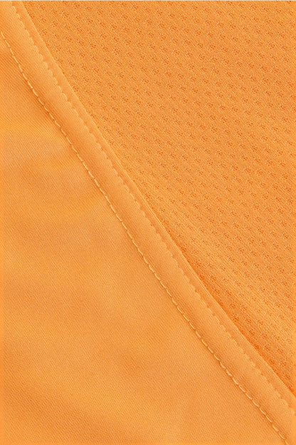 Osaka women singlet in orange with logo in grey. Detail fabric view