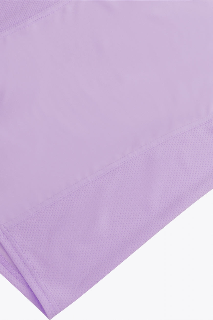 Osaka women singlet in light purple with logo in grey. Detail fabric view