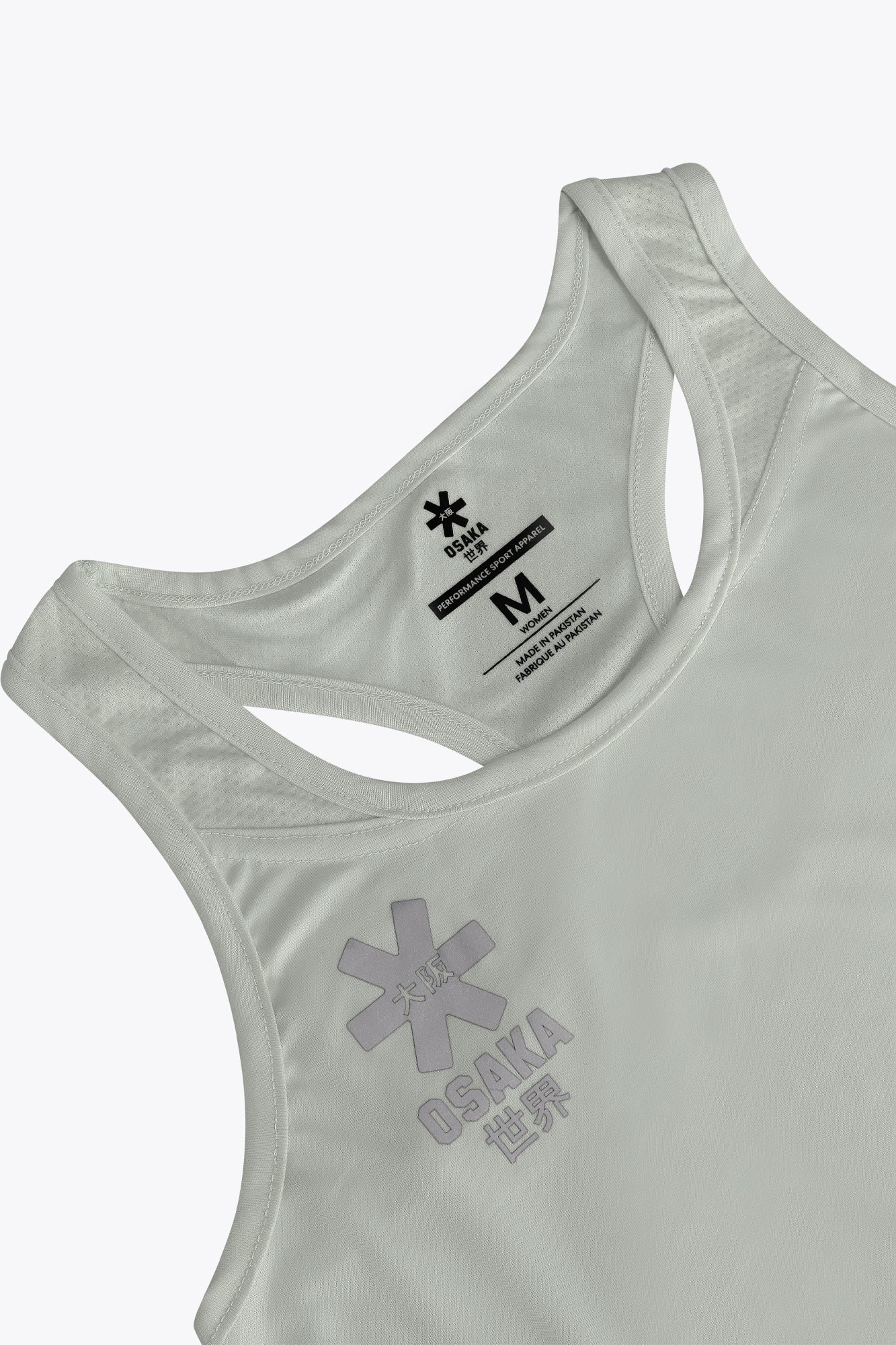 Osaka women singlet in light grey with logo in grey. Front flatlay detail view