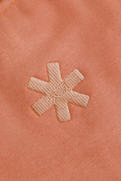 Osaka women sweater in peach with logo in white. Back detail logo view