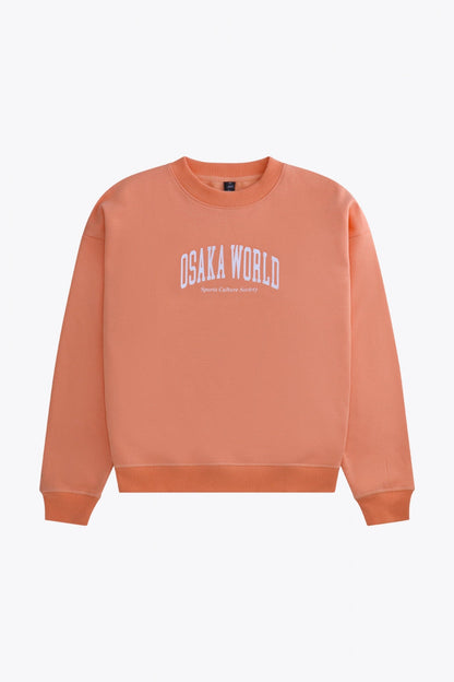Osaka women sweater in peach with logo in white. Front flatlay view
