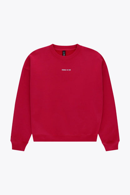 Osaka women sweater in red with logo in white. Front flatlay view
