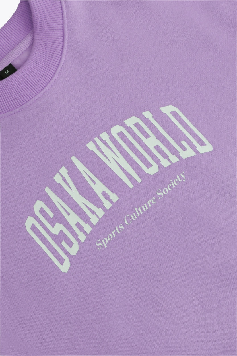 Osaka women sweater in light purple with logo in white. Front flatlay detail logo view