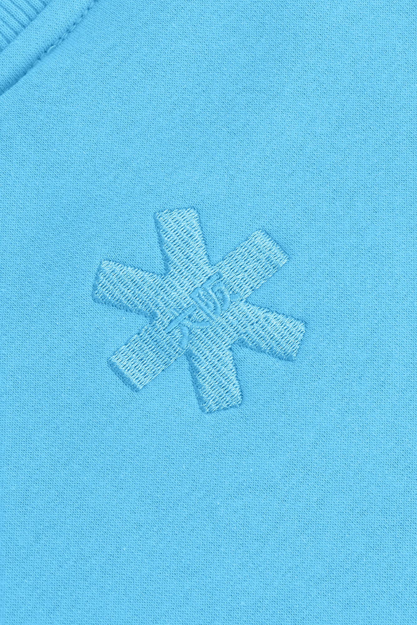 Osaka women sweater in light blue with logo in white. Back detail logo view