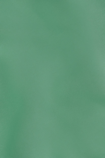 Osaka women sweater in green with logo in white. Detail fabric view