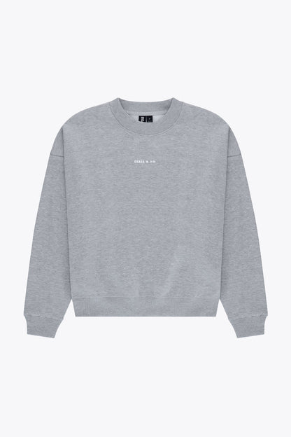 Osaka women sweater in heather grey with logo in white. Front flatlay view