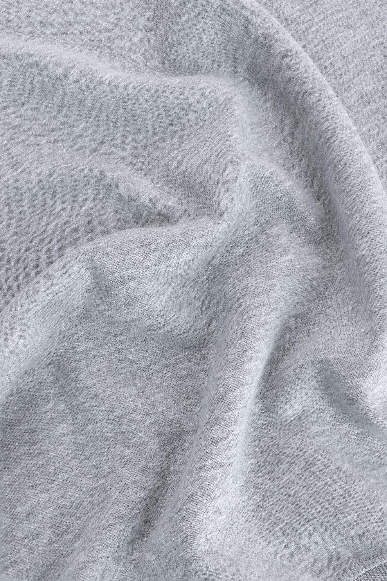 Osaka women sweater in heather grey with logo in white. Detail fabric view