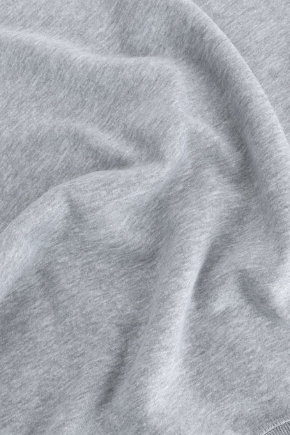 Osaka women sweater in heather grey with logo in white. Detail fabric view