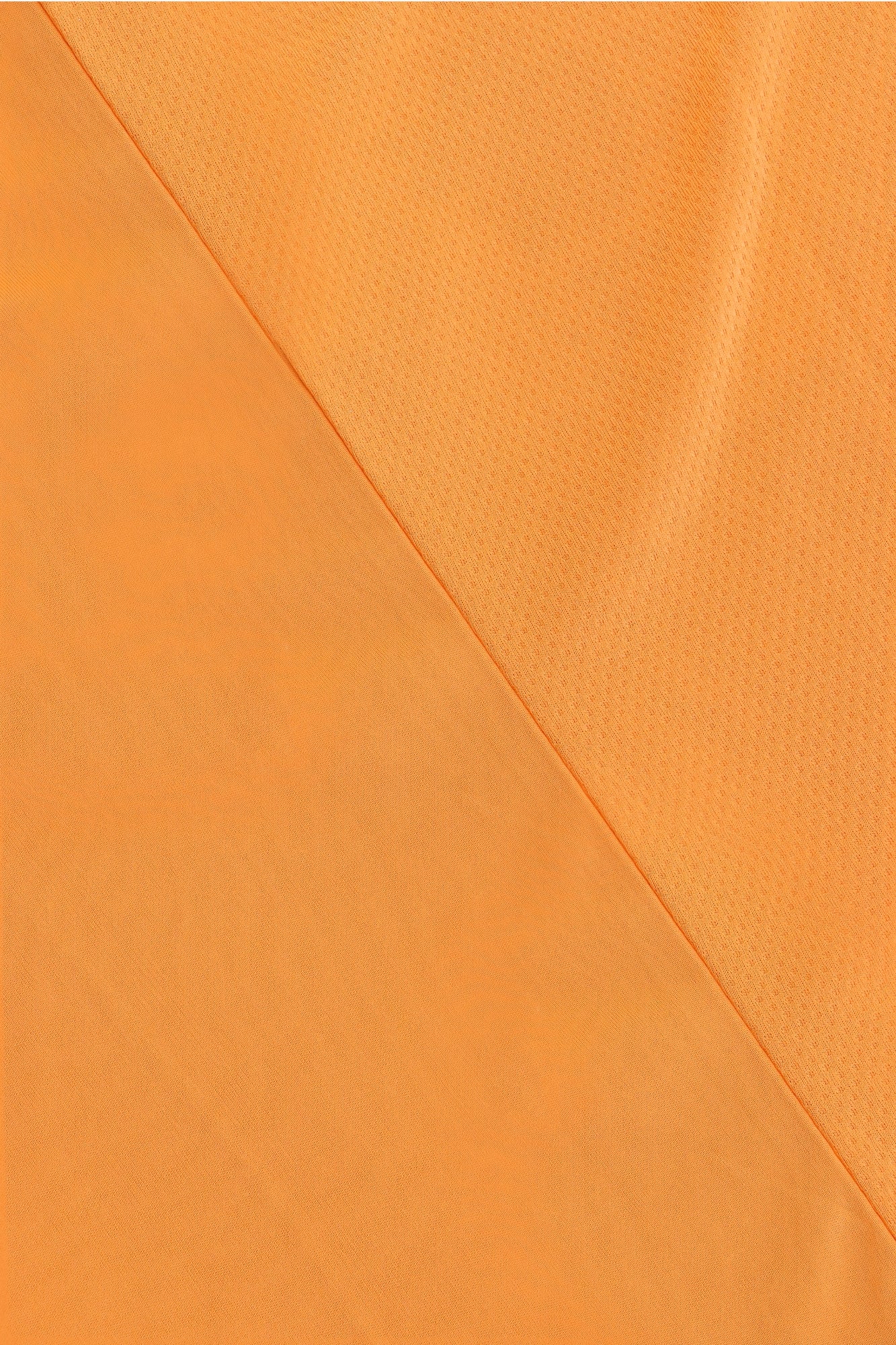 Osaka women tee short sleeve in orange with logo in grey. Detail fabric view