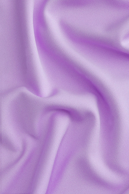 Osaka women tee short sleeve in light purple with logo in grey. Detail fabric view