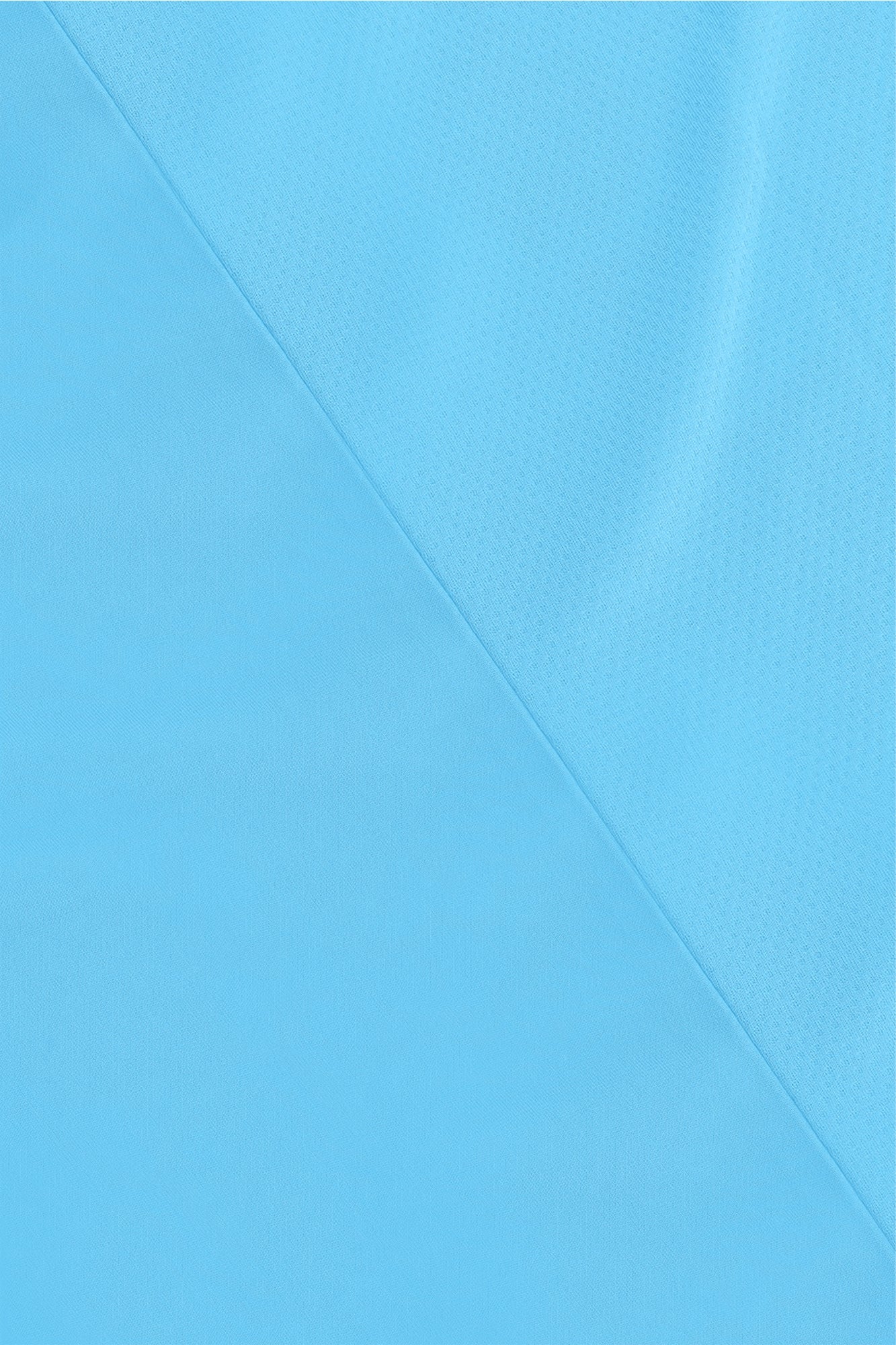 Osaka women tee short sleeve in light blue with logo in grey. Detail fabric view
