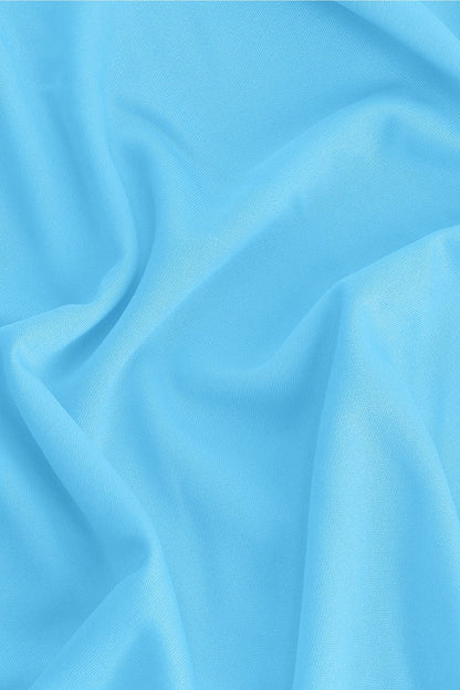 Osaka women tee short sleeve in light blue with logo in grey. Detail fabric view