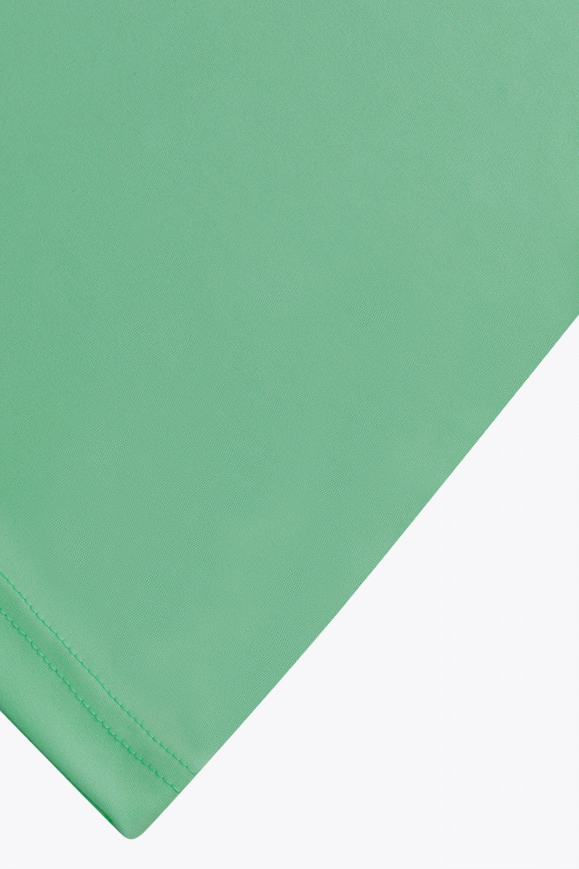 Osaka women tee short sleeve in green with logo in grey. Detail fabric view