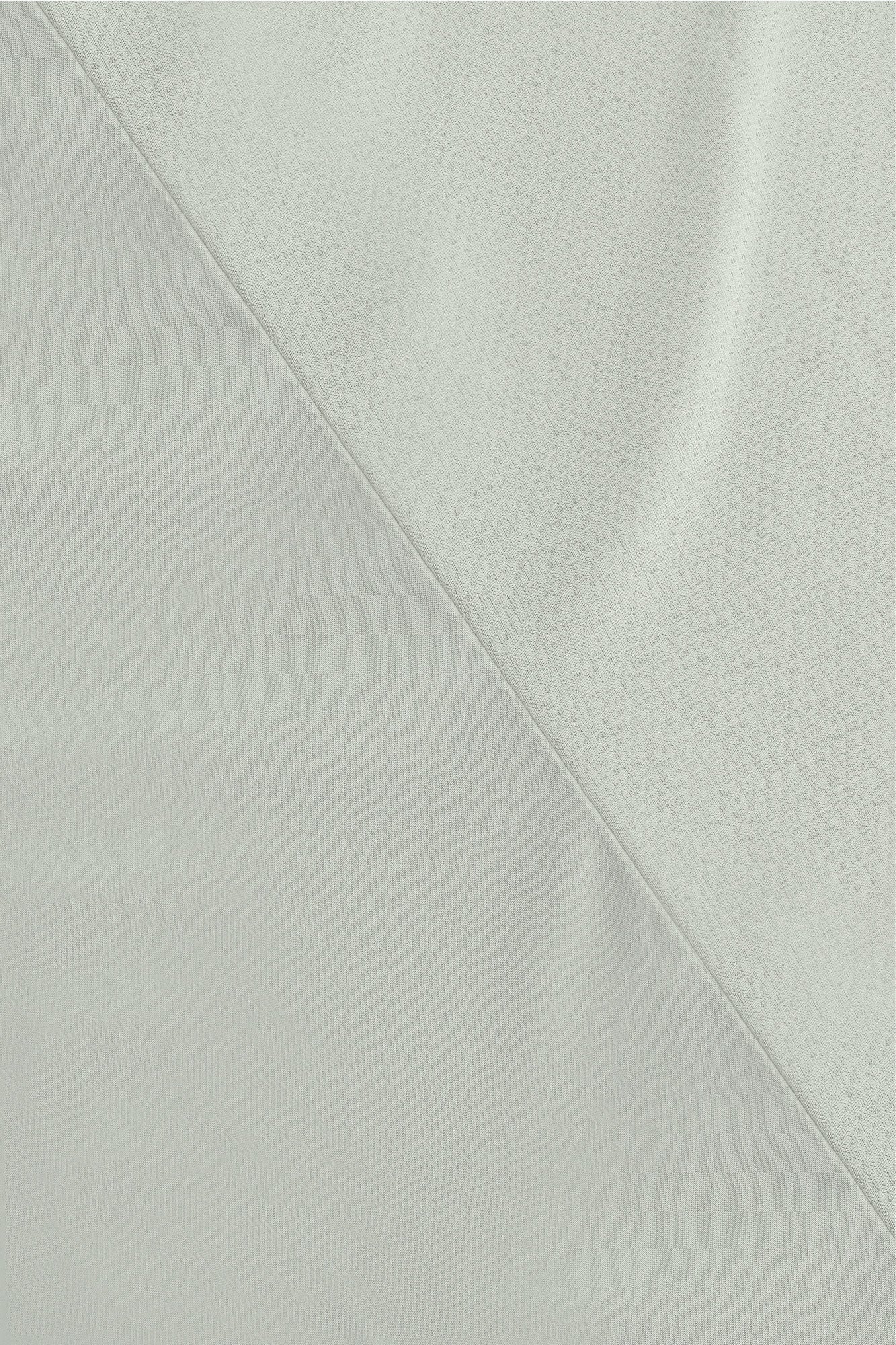 Osaka women tee short sleeve in light grey with logo in grey. Detail fabric view