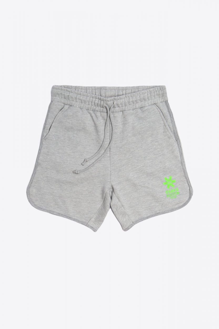 Osaka Men padel shorts in grey with green logo on it. Front flatlay view