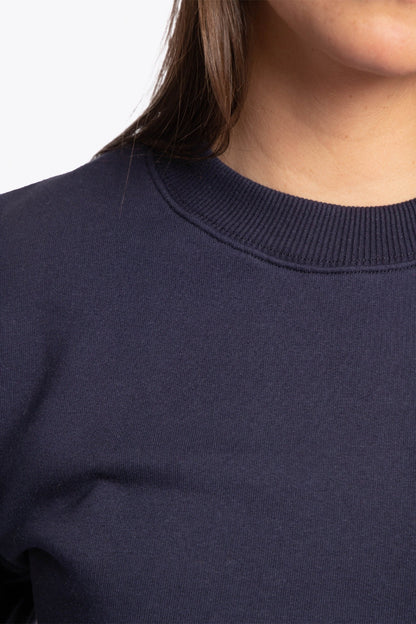 The Osaka navy basic unisex sweater with logo in white. Front detail neck view
