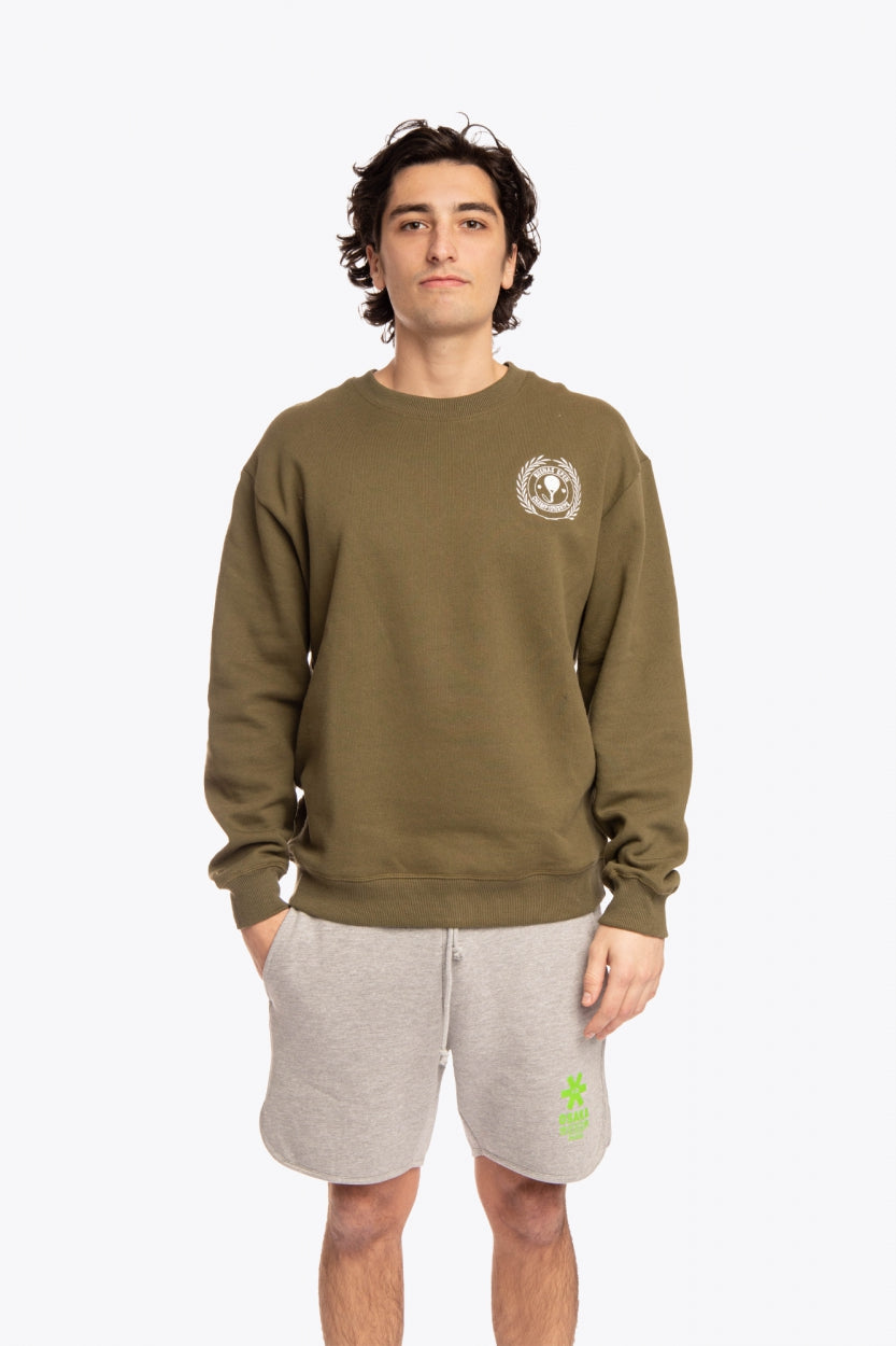 Man wearing the Osaka x Buenas Open sweater in army green. Front view