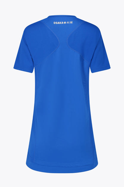 Osaka women v-neck tech dress in princess blue with logo in grey. Back flatlay view