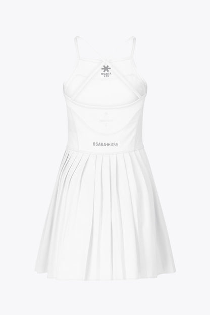 Osaka women pleated tech dress in white with grey logo. Back flatlay view