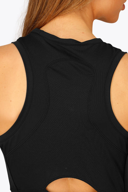 Woman wearing the Osaka women floucy dress black. Back detail view