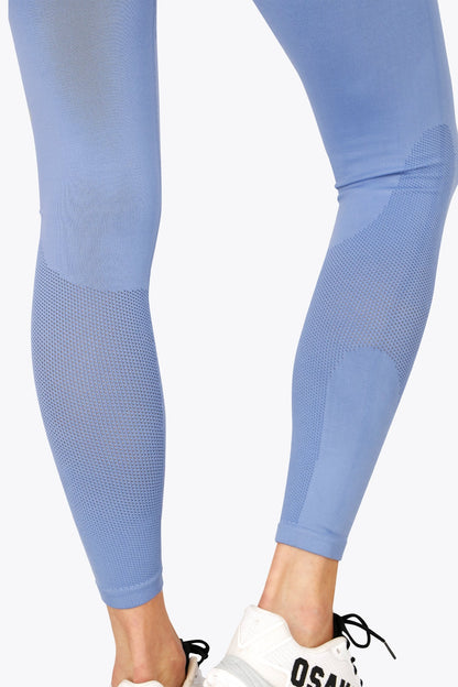 Osaka women shimuresu leggin in manor blue with logo in grey. Back detail bottom mesh view