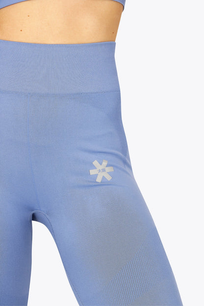 Osaka women shimuresu leggin in manor blue with logo in grey. Front detail logo view