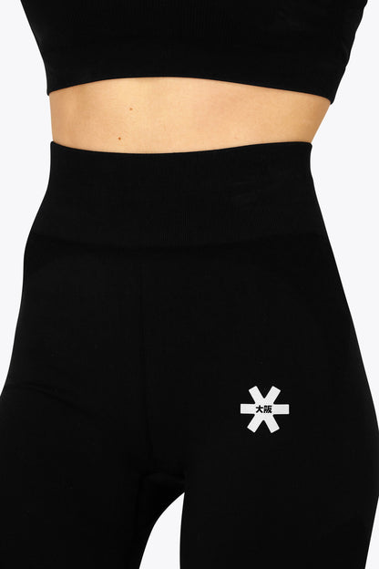 Osaka women shimuresu leggin in black with logo in grey. Front detail logo view