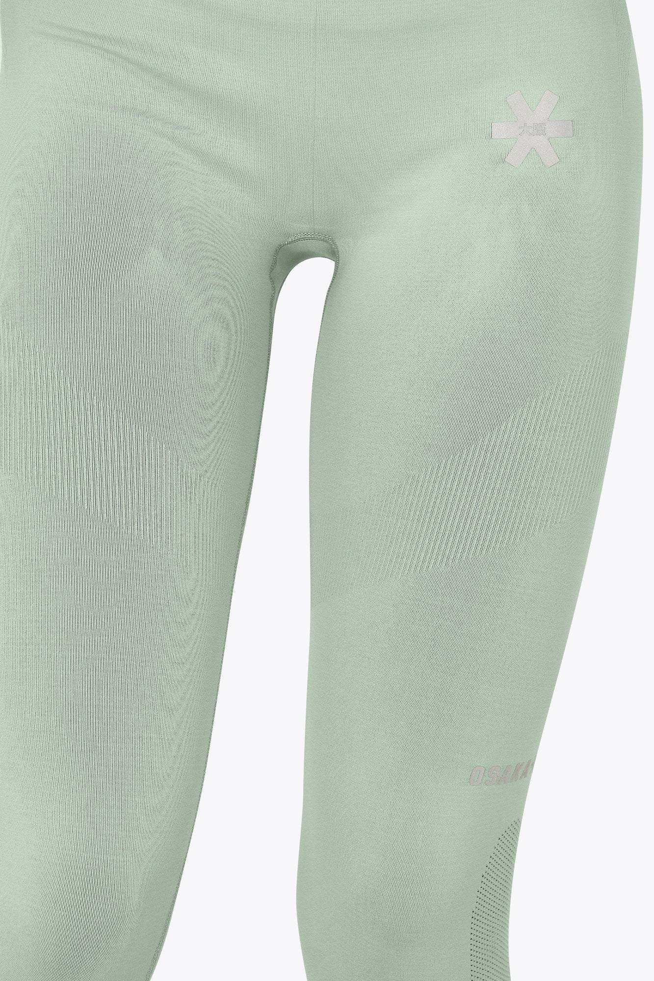 Osaka women shimuresu leggin in jadeite with logo in grey. Front detail view